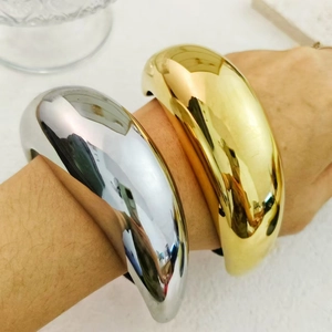 Polished stainless steel cuff bracelets in gold and silver finish for women