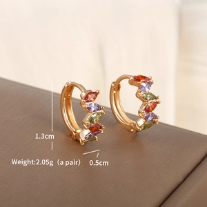 Close-up showing the precise 1.3cm height and 0.5cm width of the zircon hoop earrings