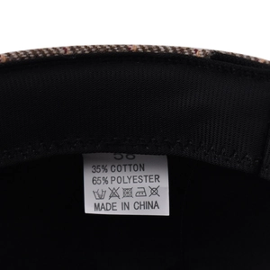 Detail view of the inner wash label showing 35% cotton and 65% polyester material