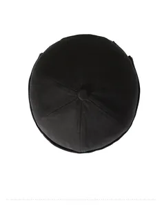 Top view of a black Miki hat with classic six-panel stitching and yellow decorative seams