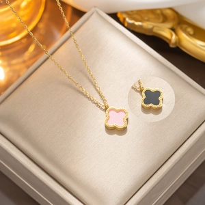 Pink shell four-leaf clover pendant necklace in gold finish with stainless steel chain