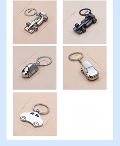 Detailed view of assorted metal car keychains with precise dimensions and weights