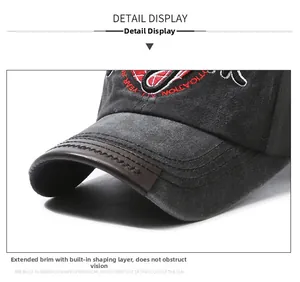 Detail of washed canvas baseball cap featuring an extended brim and leather edge trim