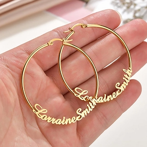 Custom gold stainless steel large hoop earrings featuring LorraineSmith name personalized style