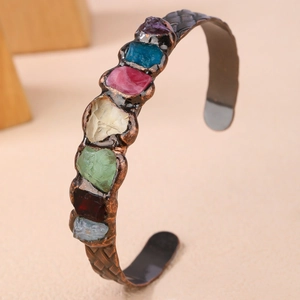 Vintage bronze cuff bracelet with seven colorful raw crystals and handmade weld details