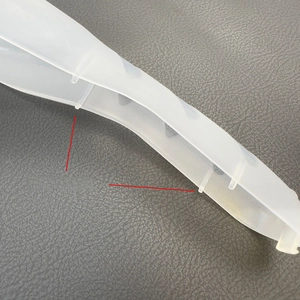 Detail view of reinforced ribs on a semi-transparent frosted razor storage case