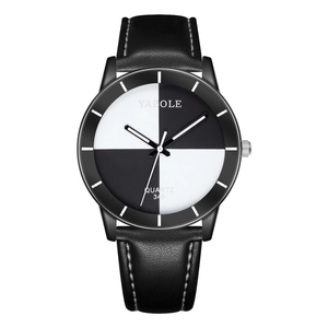 Minimalist quartz watch with diagonal black and white dial and black leather strap