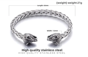 Detailed view of wolf head viking bangle with twisted texture and dimension measurements