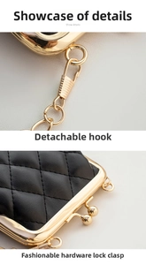 Close-up of black quilted leather coin purse with golden kiss lock and metal clasp detail