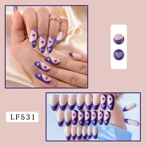 Purple and pink almond press-on nails with heart patterns and hand-worn view