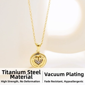 Macro shot of gold titanium steel coin necklace with zircon heart pendant detailing