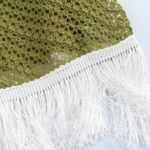 Elegant green mesh knit halter dress with white tassel fringe detailing for vacation style