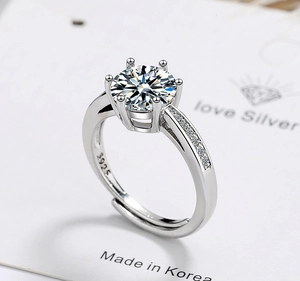 Macro shot of S925 sterling silver six-prong crown ring with round cubic zirconia