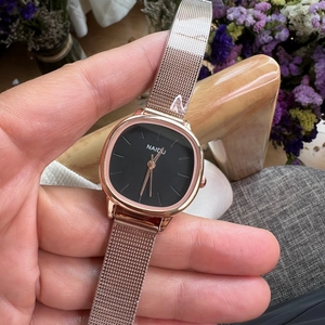 Minimalist square quartz watch with black dial and rose gold Milanese mesh strap for women