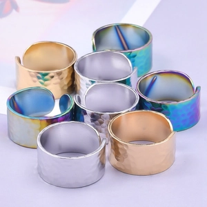 Adjustable wide hammer textured stainless steel rings in gold, silver, and rainbow colors