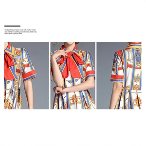 Retro print short sleeve dress with gold chain patterns and red bow neck detail