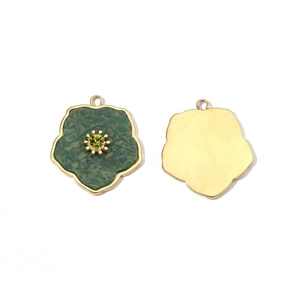 Detail of flower-shaped gold pendant with green enamel and crystal inlay in dual views