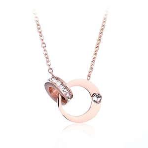 18k rose gold interlocking double ring necklace with solitaire diamond on white background