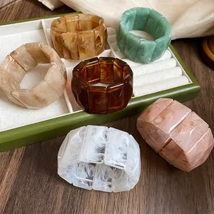 Elastic acrylic bangle with colorful marble patterns and artistic ink textures for women