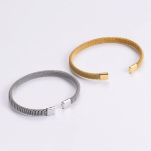 Adjustable 18k gold and silver plated stainless steel mesh cuff bracelet set on white background