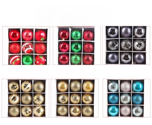Detailed view of 8cm assorted Christmas baubles in matte, glossy, and glitter textures