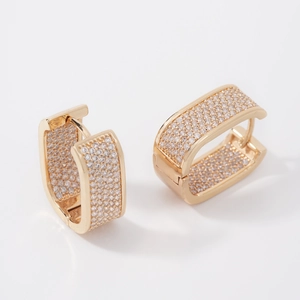 Elegant gold U-shape huggie earrings with shimmering white pave-set zircons