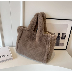 Close-up of the plush brown faux fur tote bag showing its soft and fluffy texture