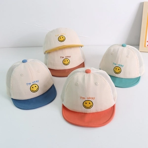 Close-up of breathable mesh baby sun hats featuring embroidery smile face and I'm okay text