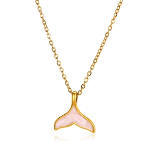 Macro view of gold-plated whale tail necklace featuring pink marbled resin inlay detail