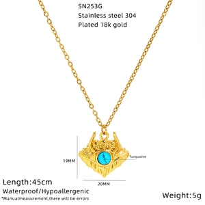 Detail view of 18K gold plated stainless steel evil eye pendant with turquoise stone
