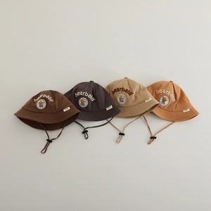 Cute cartoon bear baby sun hats in earth tones with adjustable chin straps for toddlers