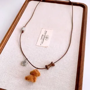 Cute brown plush puppy pendant necklace with silver star and bone charm for women