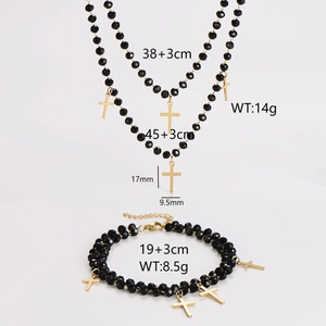 Elegant black glass bead necklace and bracelet set featuring a gold cross pendant charm