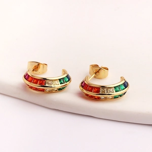 Gold C-shaped hoop earrings featuring a spectrum of rainbow rectangular gemstones