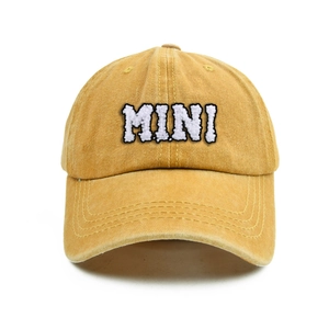Mustard yellow kids baseball cap with MINI embroidery in high-quality washed cotton