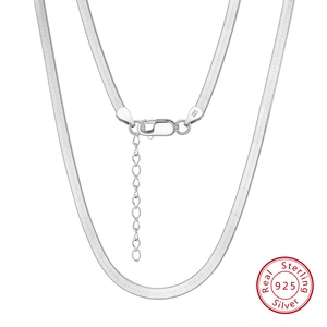Detail of 925 sterling silver herringbone chain with lobster clasp and S925 Italy hallmark