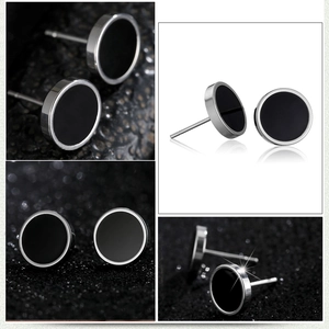 Minimalist black barbell stud earrings in stainless steel with cat eye stone accents