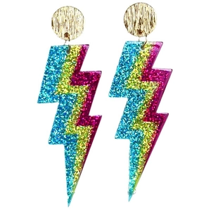 Close-up of lightning bolt earrings with glitter gradient finish and gold metal hooks