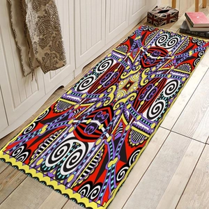 Bohemian geometric runner rug with vibrant patterns on a modern grey wood floor