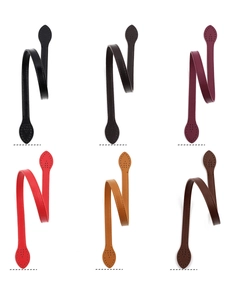Detail view of 60cm PU leather bag handles with stitched leaf shape and pre-punched holes