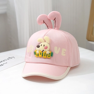 Detailed view of pink toddler baseball cap with 3D plush ears and cute dog patch