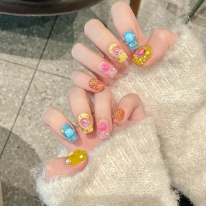 Colorful 3D press-on nails featuring cute turtle and candy relief decorations