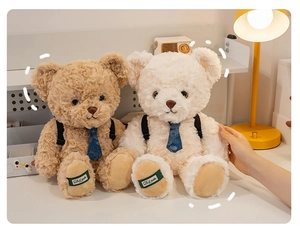 Detailed view of plush teddy bears with mini backpacks and blue ties in cozy desktop setting