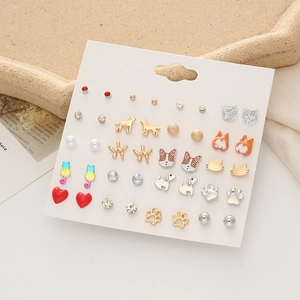 Detail of 20-pair earring set featuring cute corgi, cat, and paw print stud designs