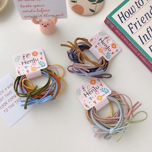 Morandi elastic hair ties set with bow details on pink floral card display