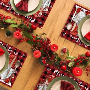 Christmas placemat set with gnome design and red-black buffalo plaid on a wooden table