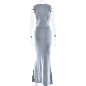 Close-up of gray-blue knitted two-piece set featuring a sleeveless top and a maxi skirt