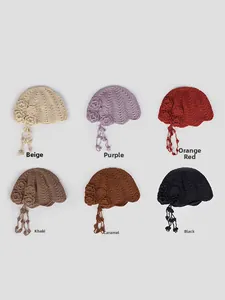 Handmade crochet beret collection featuring 3D flowers and tassel details in six colors