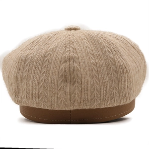 Retro khaki knit newsboy cap with brown leather brim for women in classic autumn style
