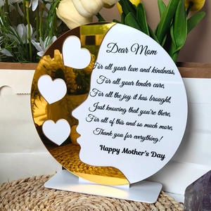 Detail of round Mother's Day plaque with three heart photo slots and golden poem